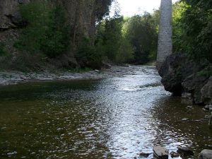 The shallow waters of the Irvine River are an inviting place to play, all summer long.